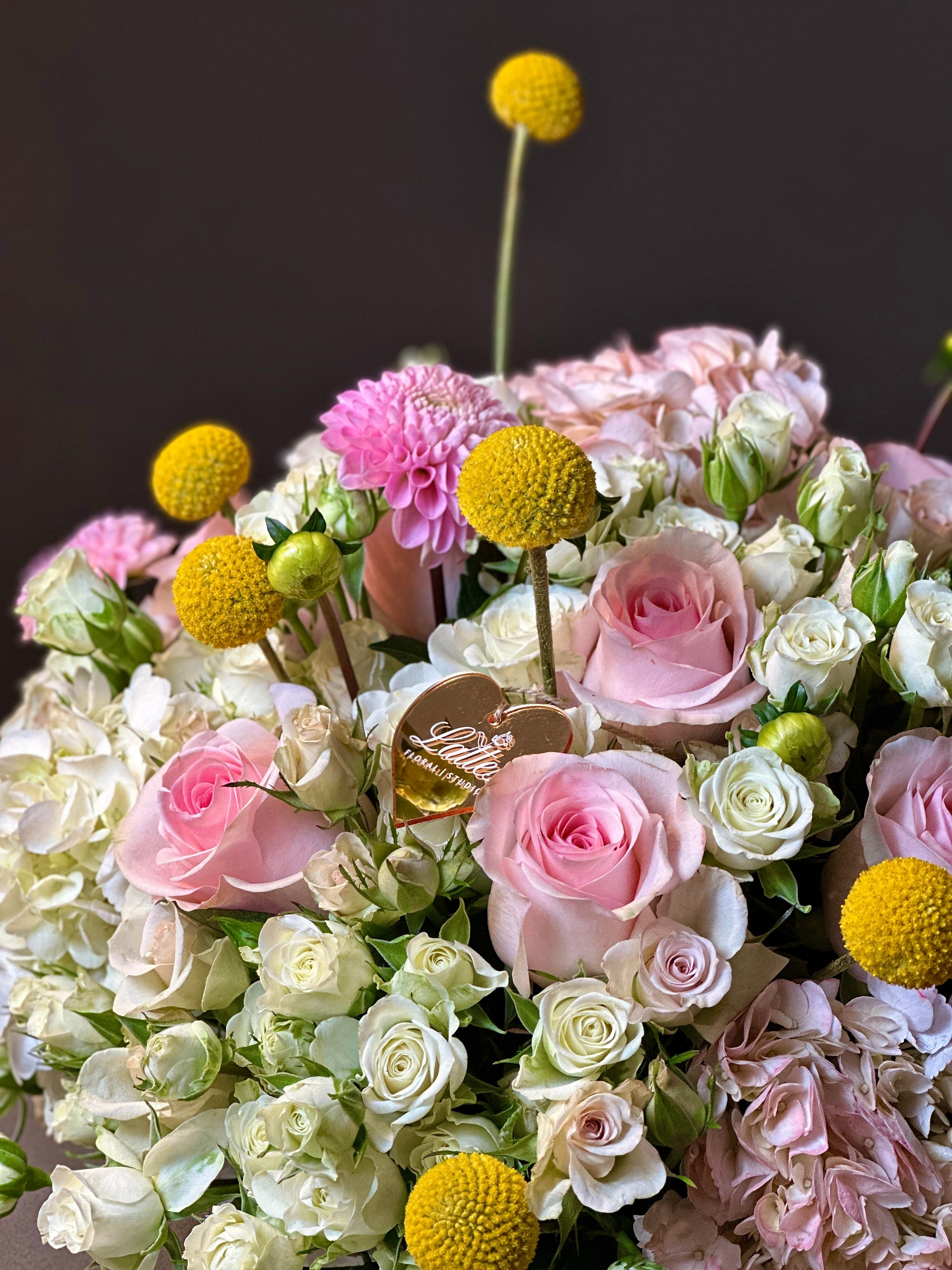 Golden Bliss Floral Arrangement – Roses, Spray Roses, Hydrangea & Craspedia