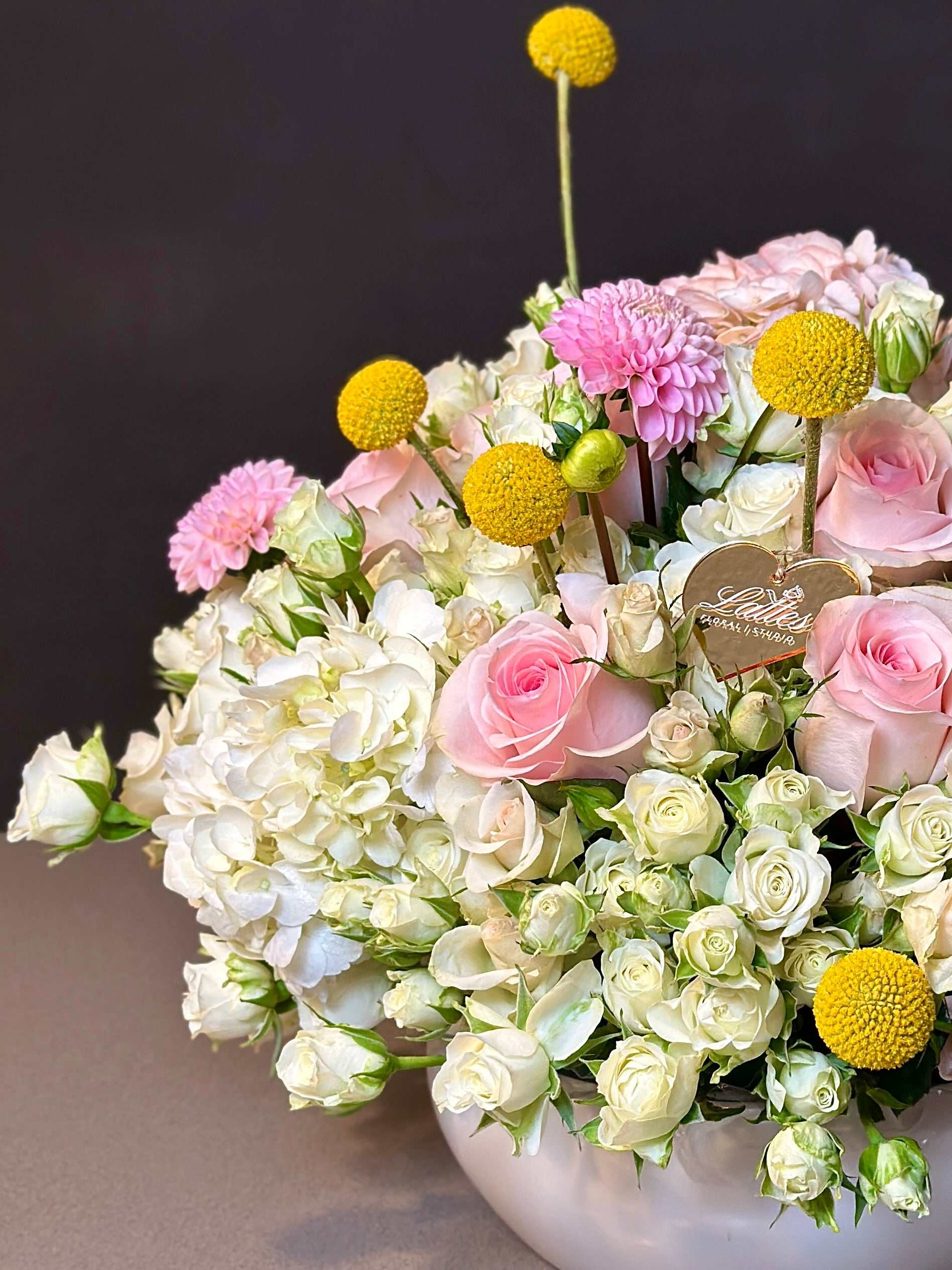 Golden Bliss Floral Arrangement – Roses, Spray Roses, Hydrangea & Craspedia