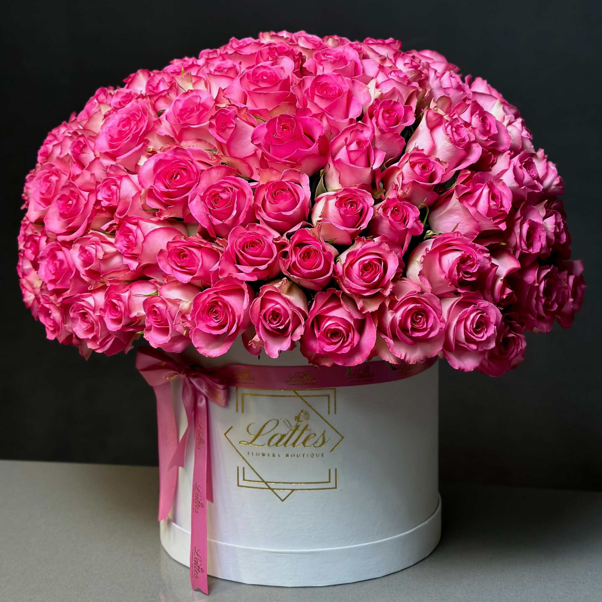 Box of 200 premium mono pink roses in a chic arrangement