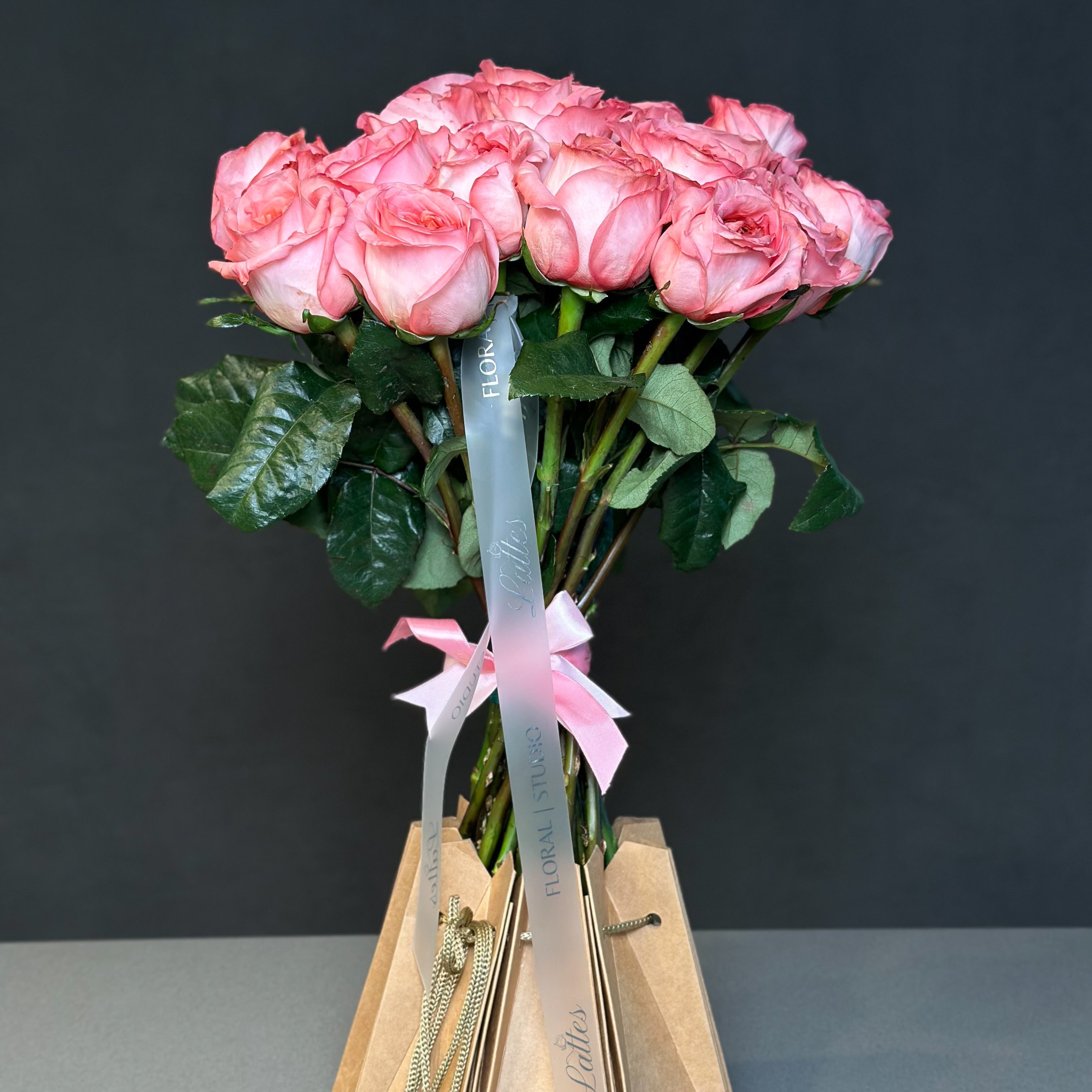 Pink Roses in Aqua Vase