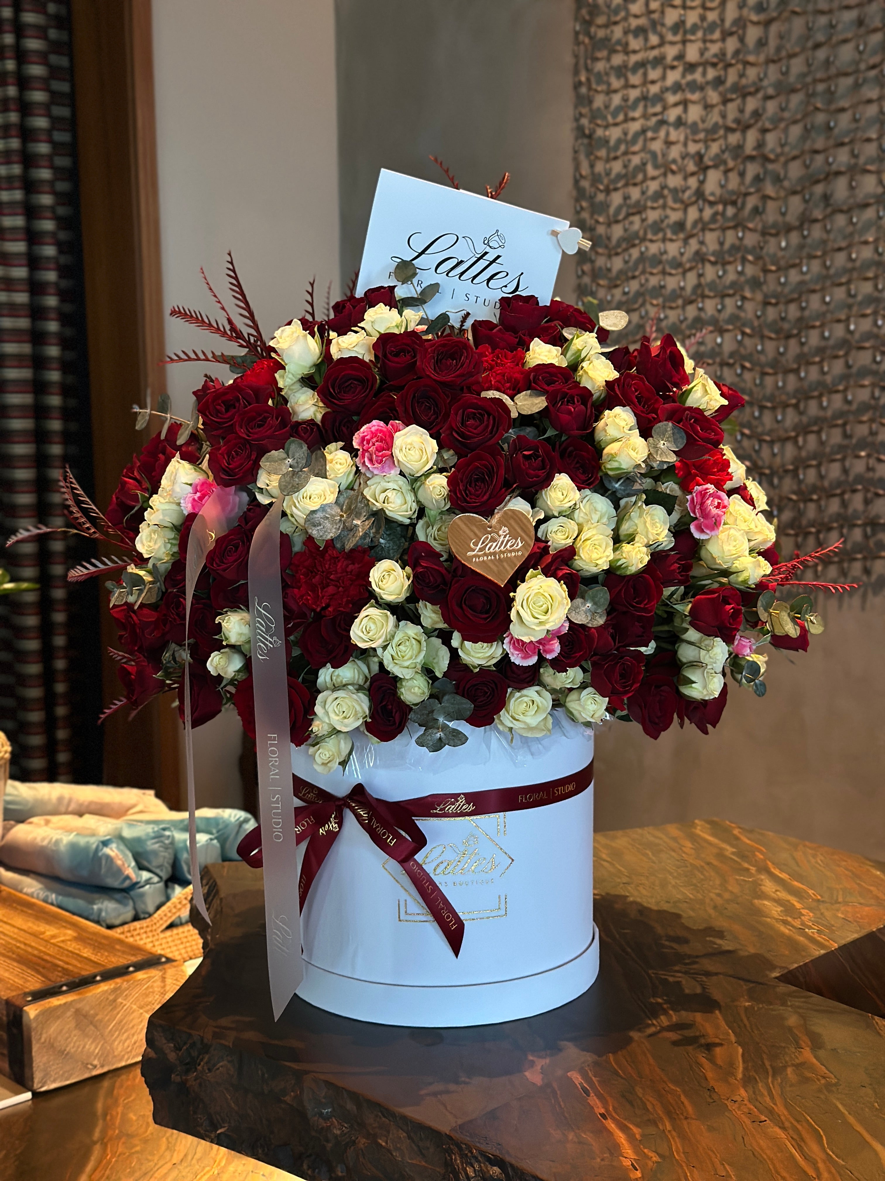 Crimson Elegance – Red and White Roses in a Flower Box