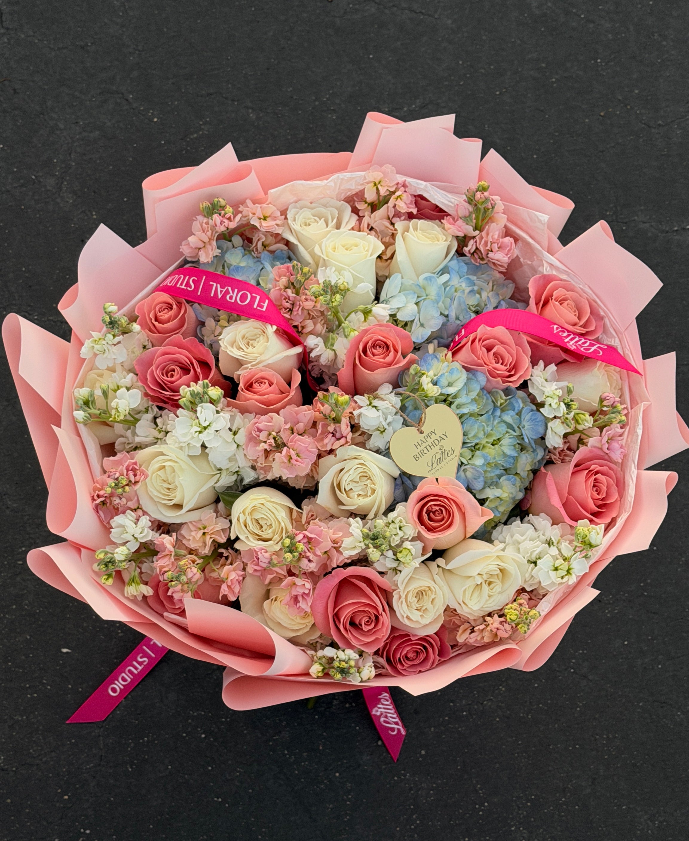 Pastel Skies – Mixed Roses, Blue Hydrangeas & Stock Bouquet