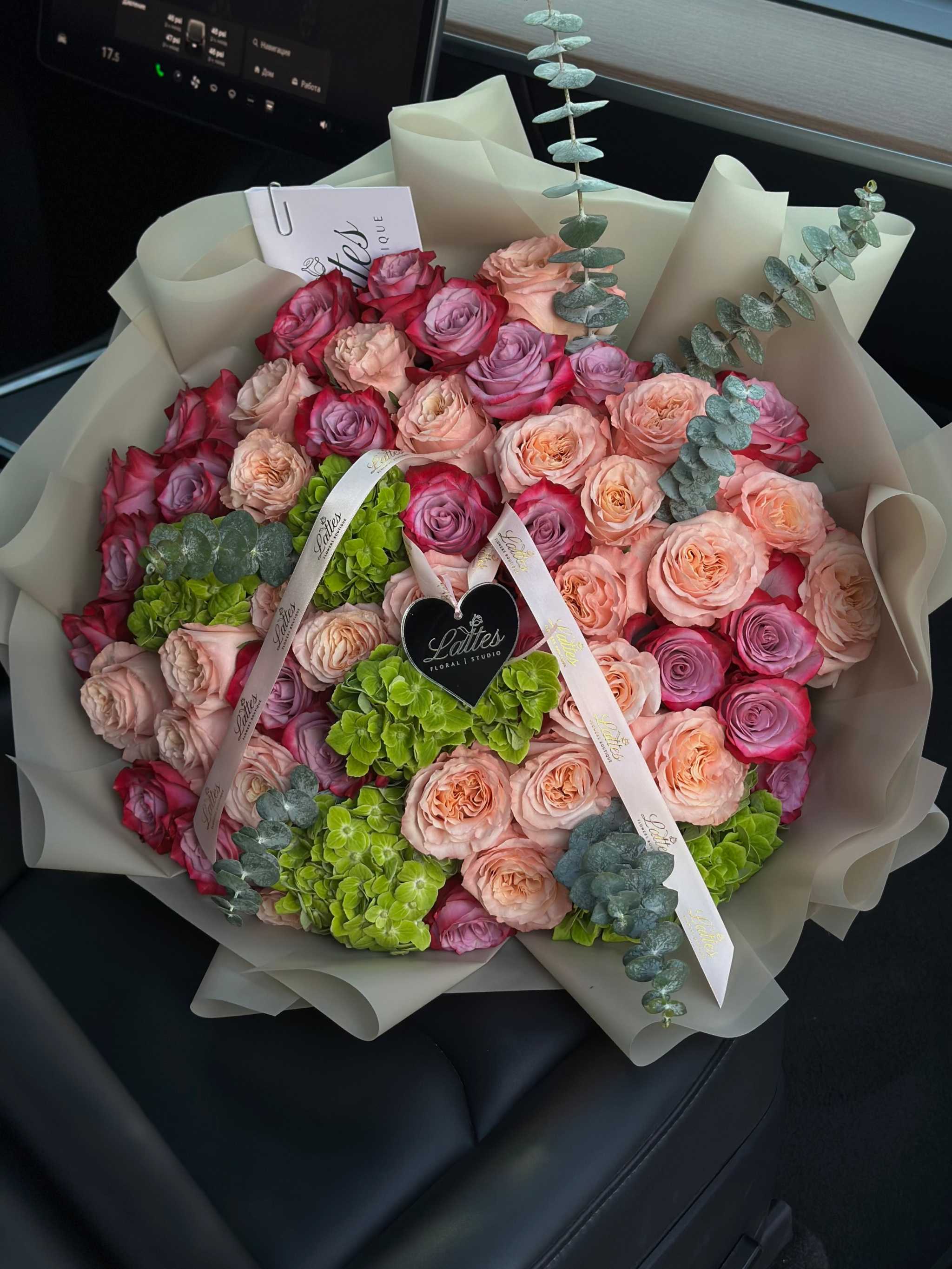 Jardin des Reves bouquet with green hydrangea, eucalyptus, pale pink and purple roses, elegant floral arrangement