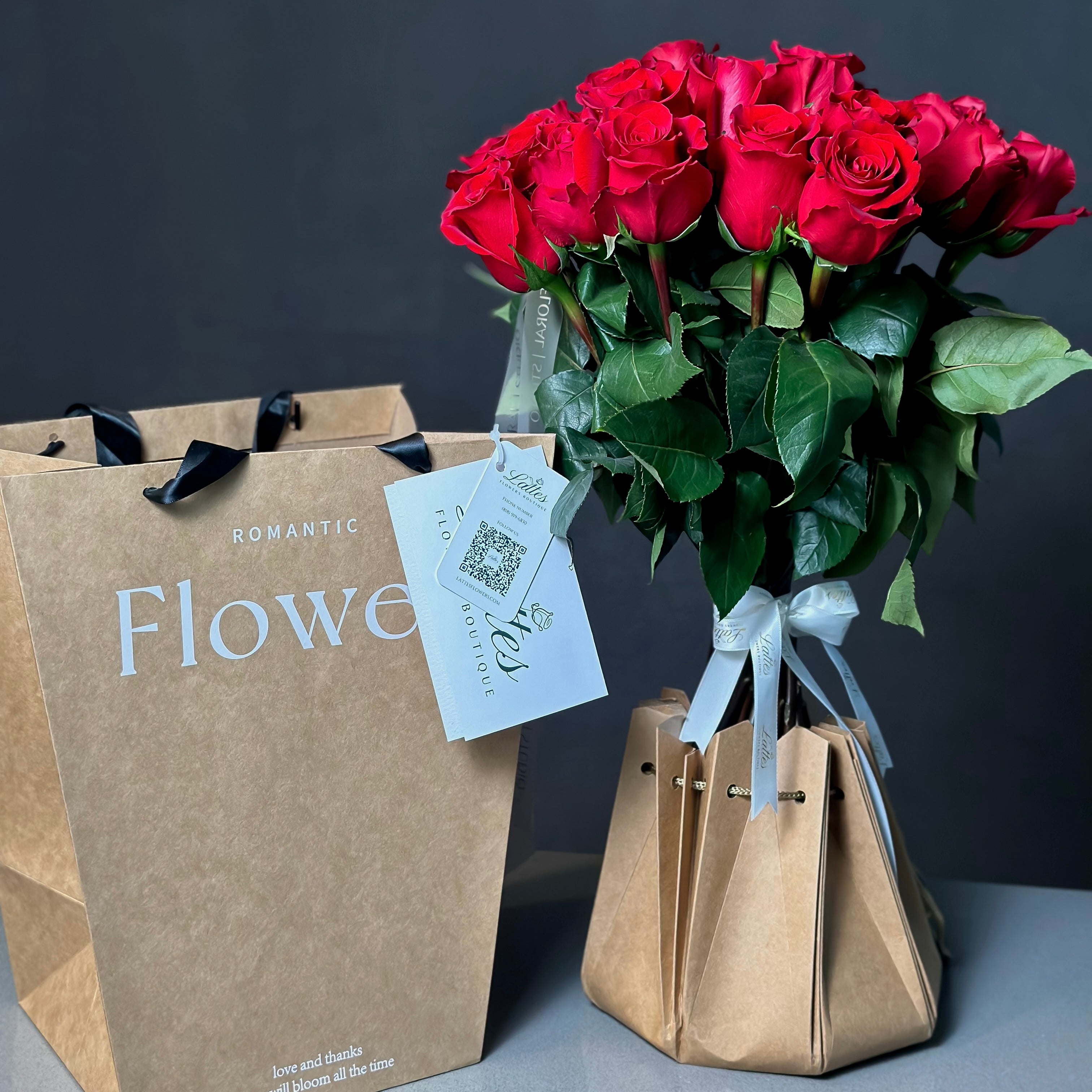 Red Roses in Aqua Vase