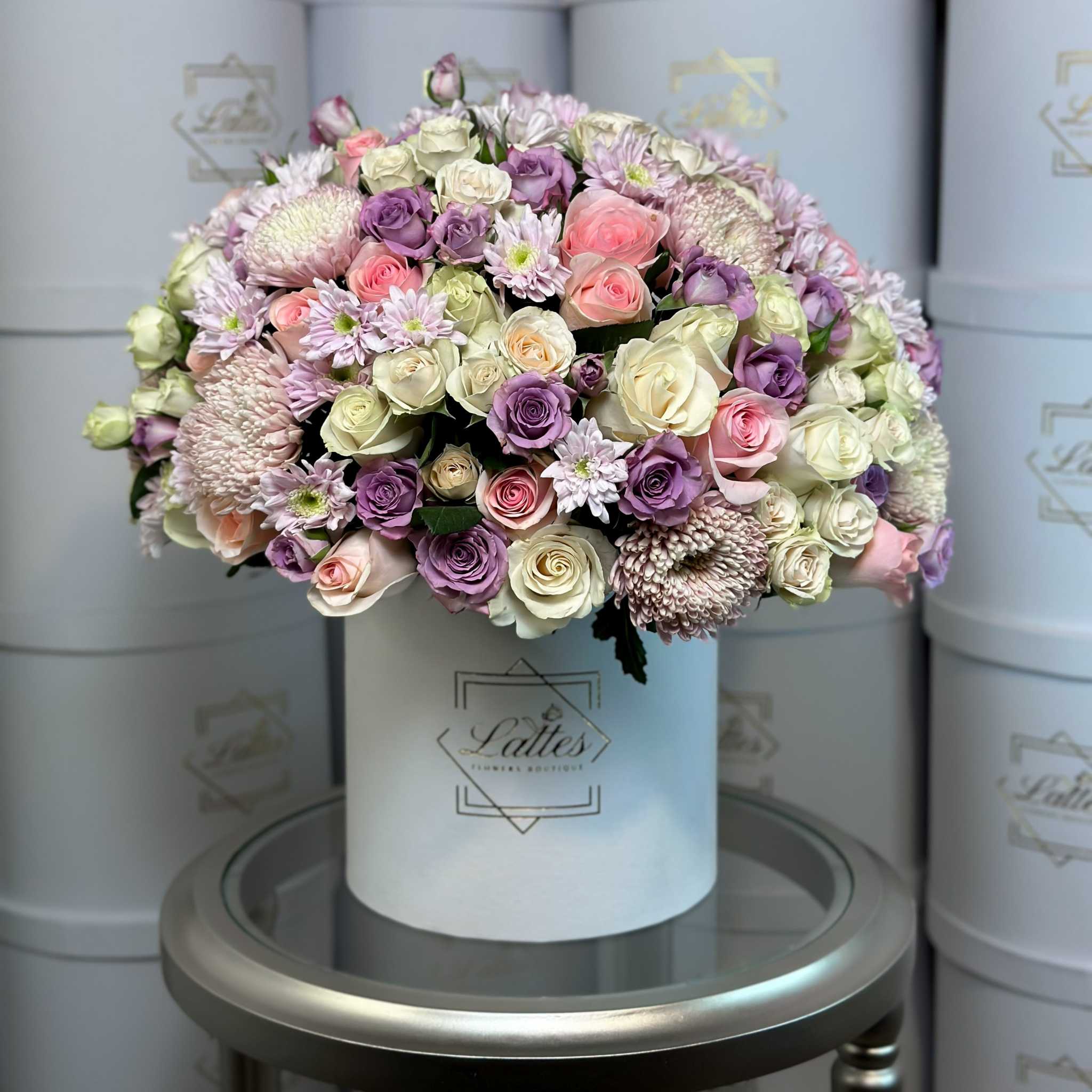 Bacio di Petali bouquet with roses, chrysanthemums, eustomas, and white flowers in elegant arrangement