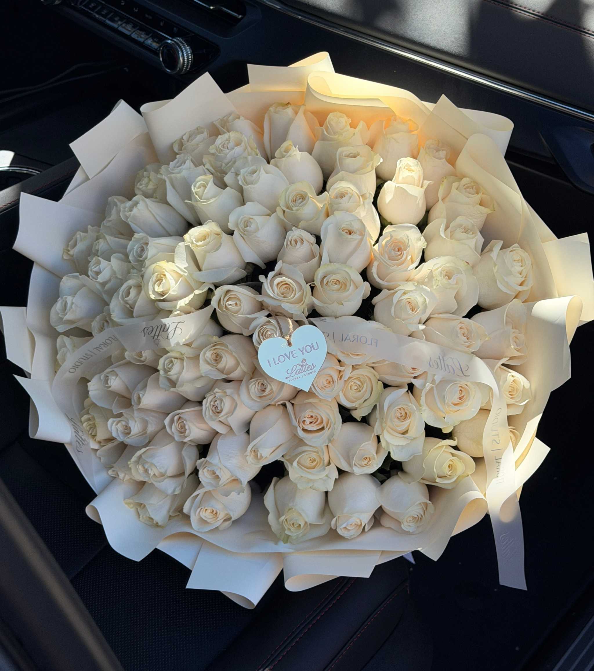 Luxury white roses bouquet with long stems, elegant and perfect for special occasions