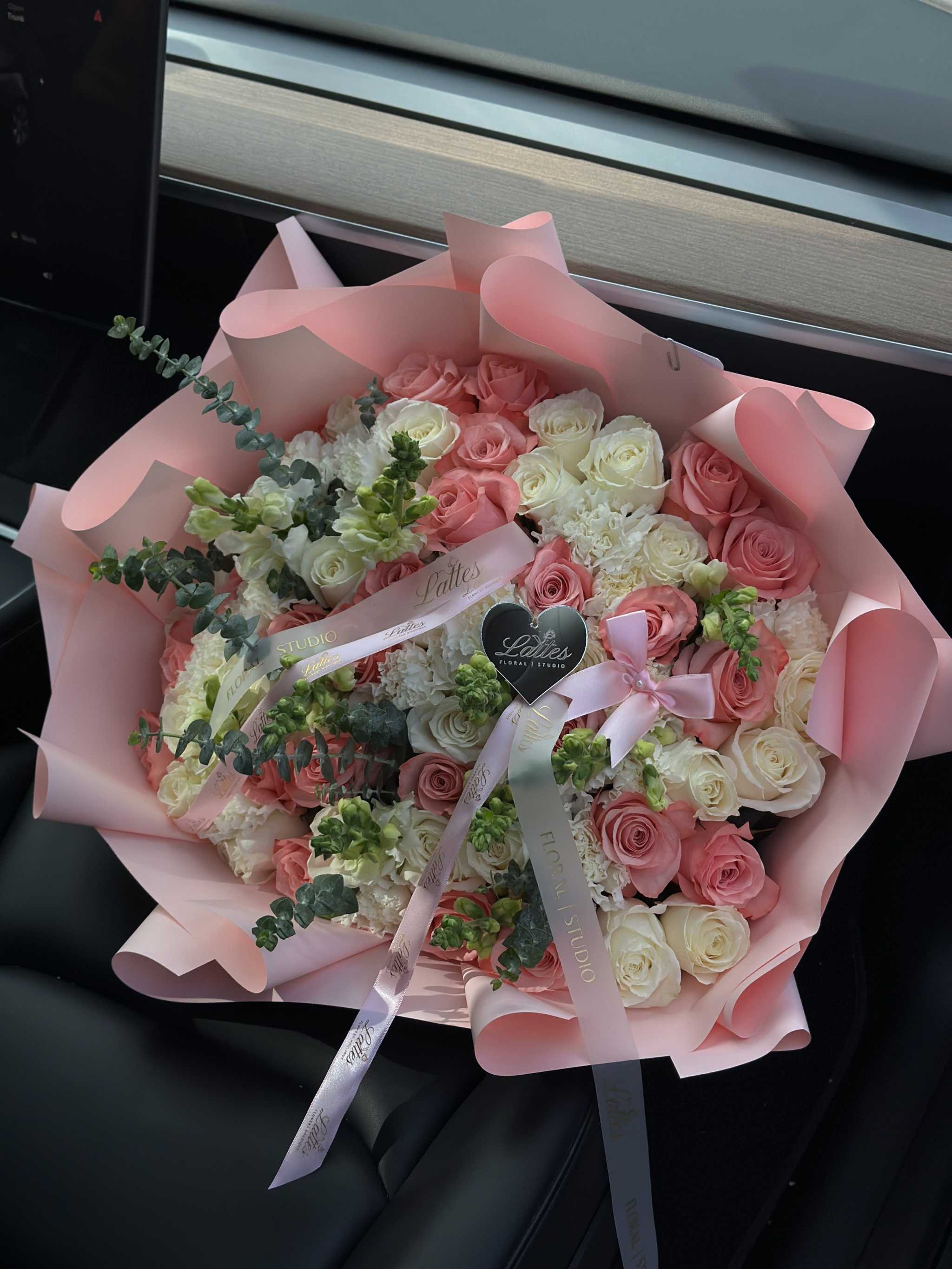 Sunset Glow bouquet of white and pink roses with pastel colors from Lattes Floral Studio