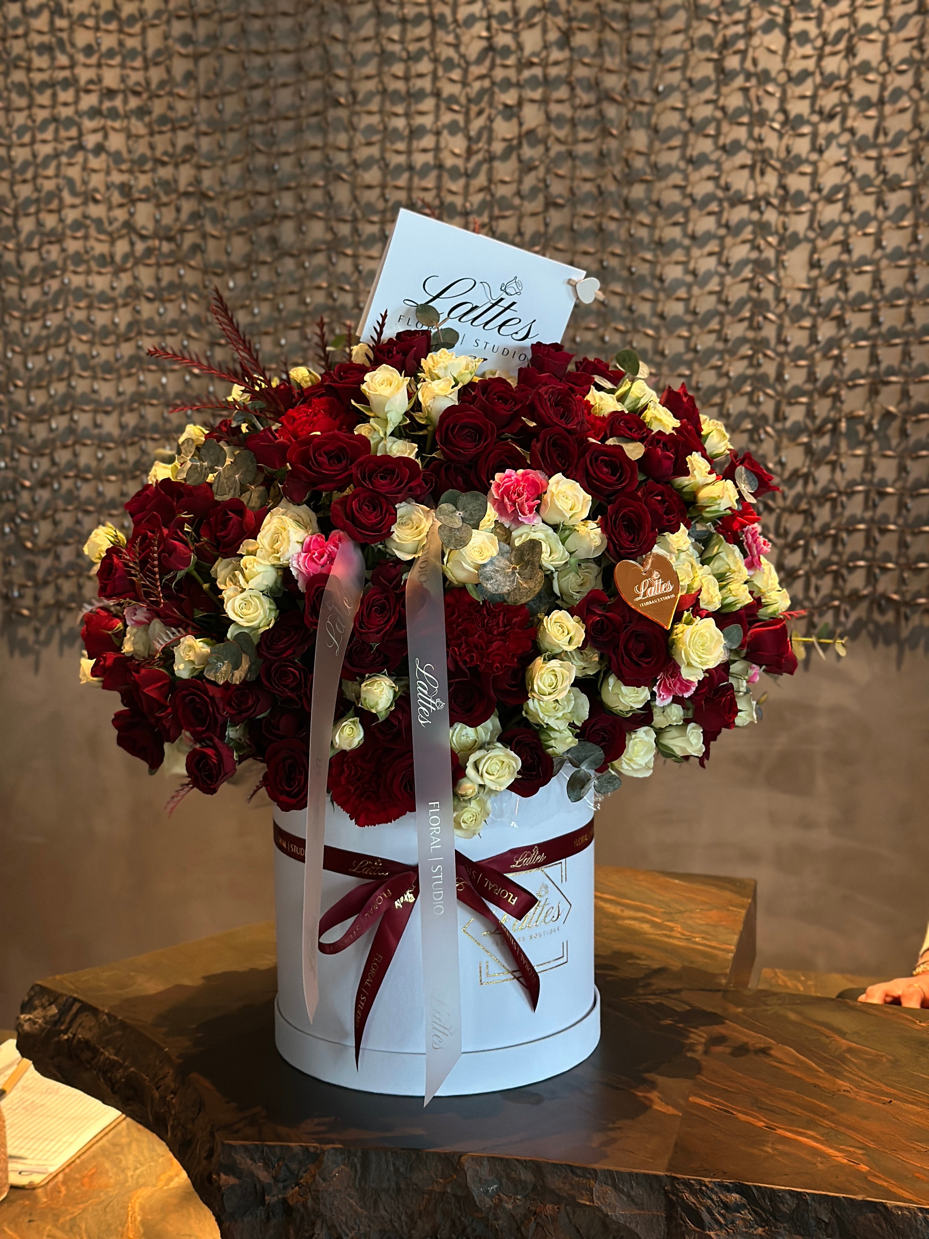 Crimson Elegance – Red and White Roses in a Flower Box