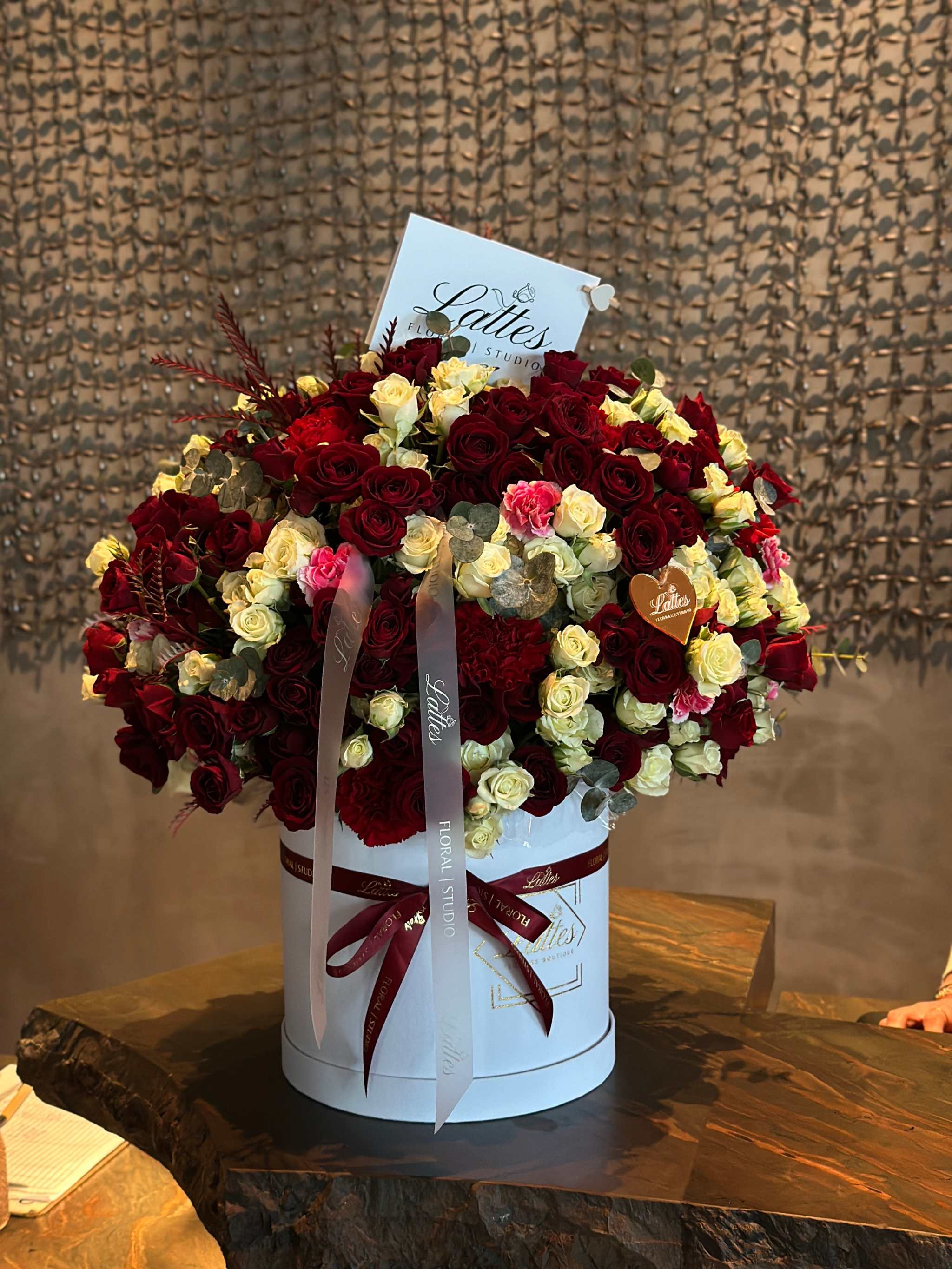 Crimson Elegance – Red and White Roses in a Flower Box