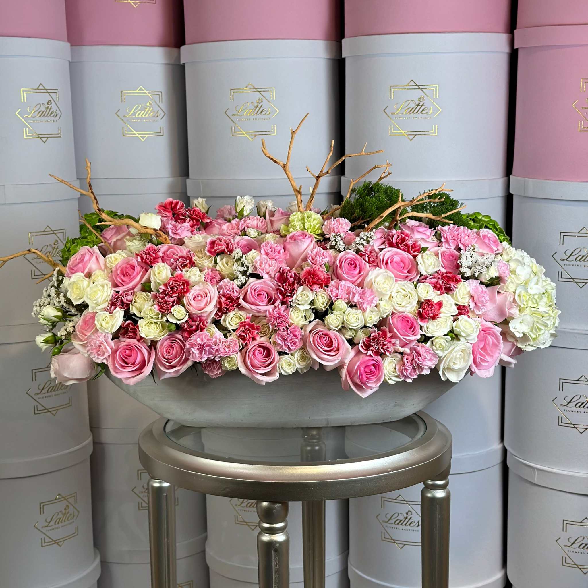 Elegant Pink Island Love floral arrangement with soft pink and pastel flowers