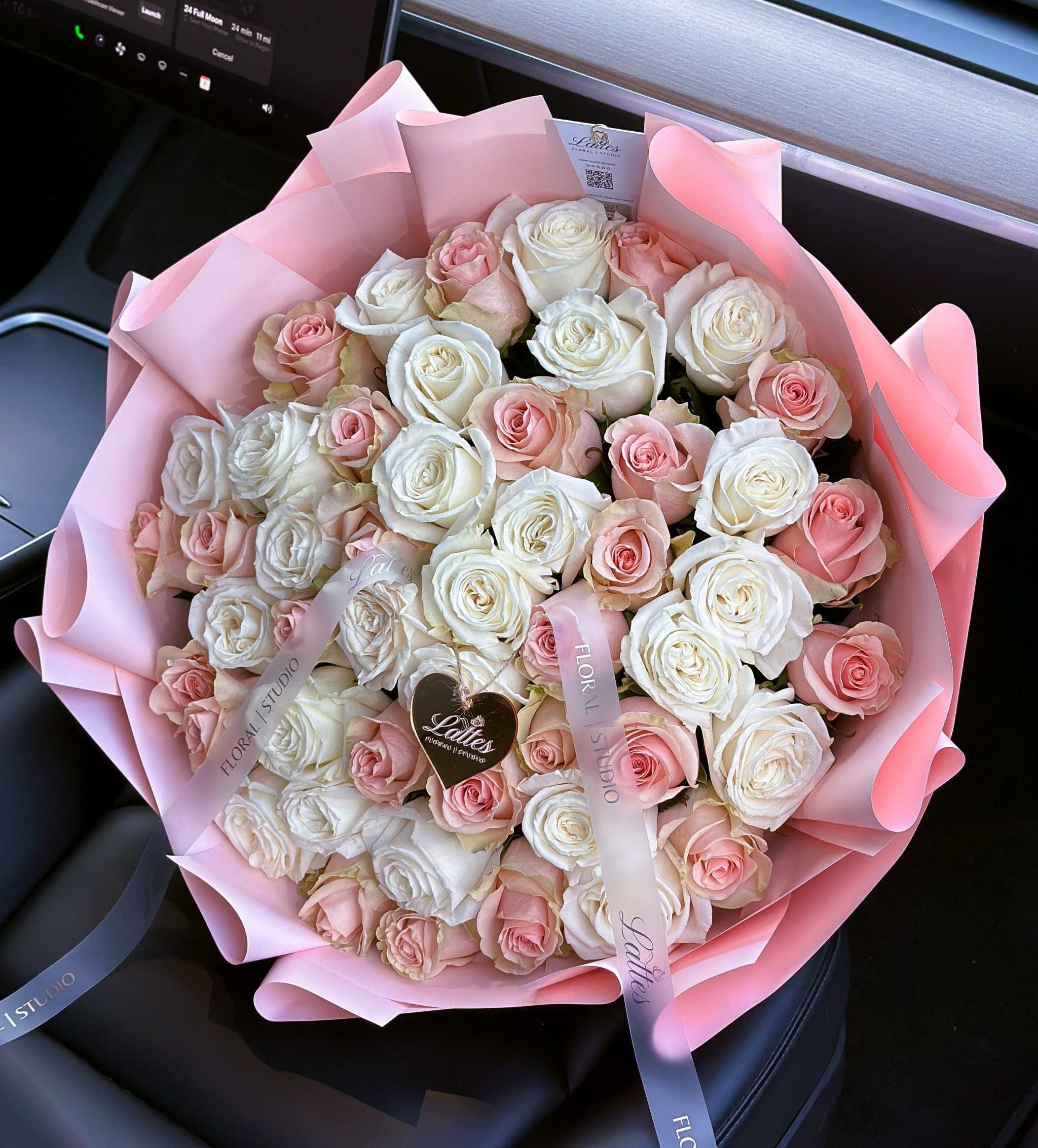 Soft Embrace bouquet of white and pink roses wrapped in soft pink paper for romantic occasions