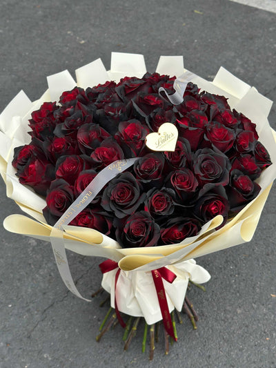 Midnight Passion Bouquet of deep red and black roses with elegant wrapping and same-day delivery