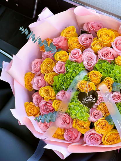Lumiere de Provence – Bouquet of Yellow and Pink Roses with Green Hydrangeas