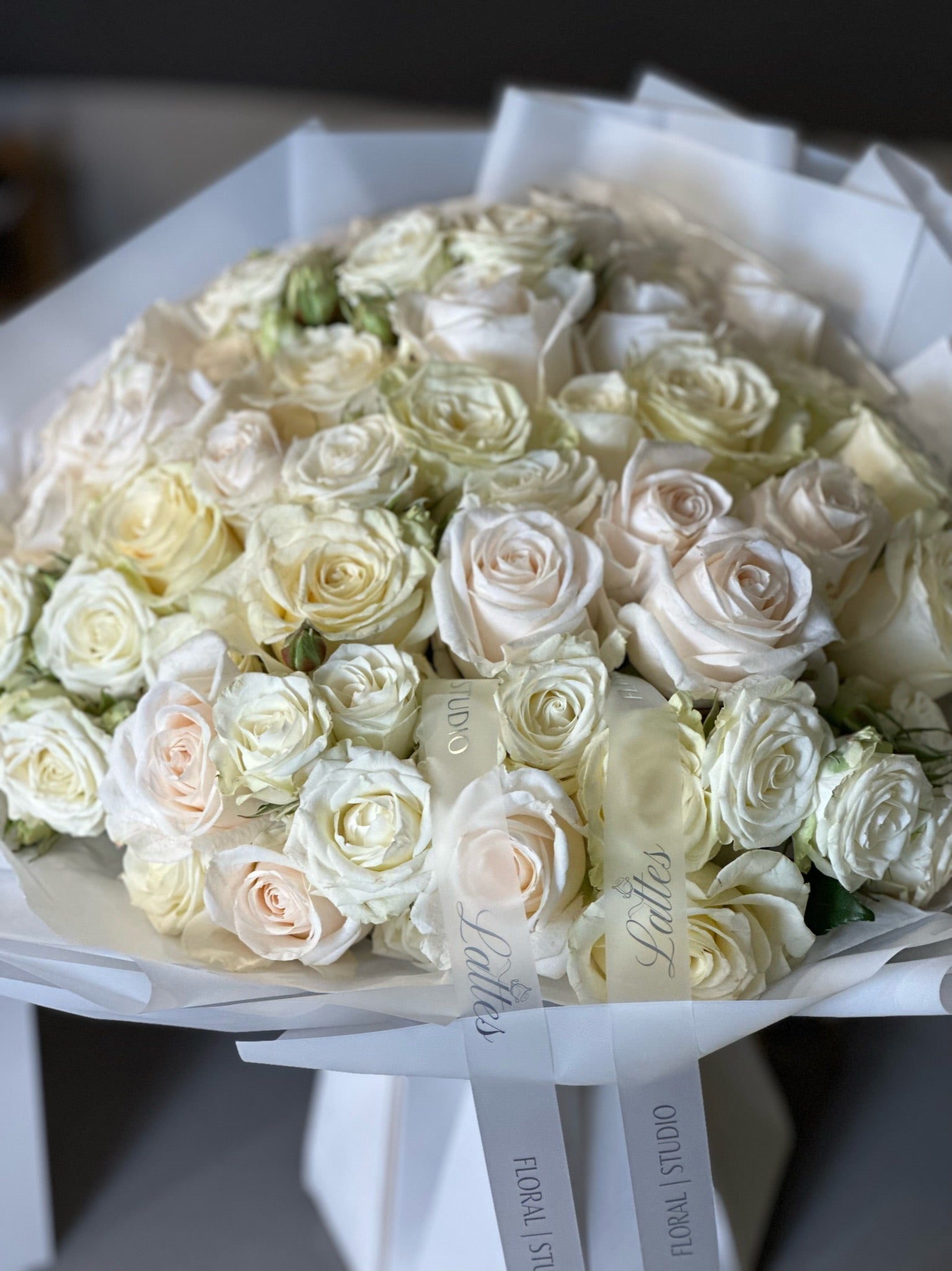 White Roses in Aqua Vase