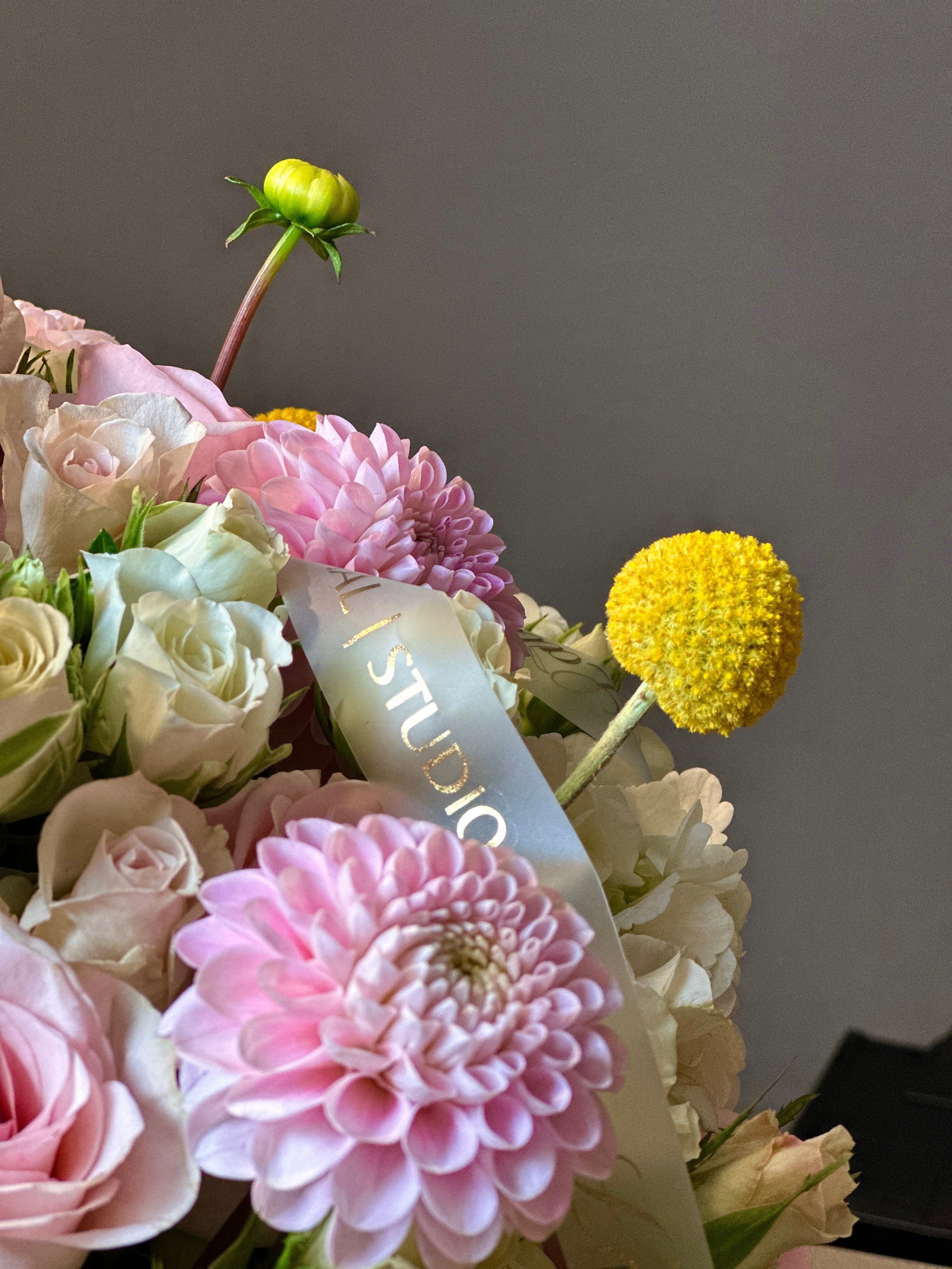 Golden Bliss Floral Arrangement – Roses, Spray Roses, Hydrangea & Craspedia