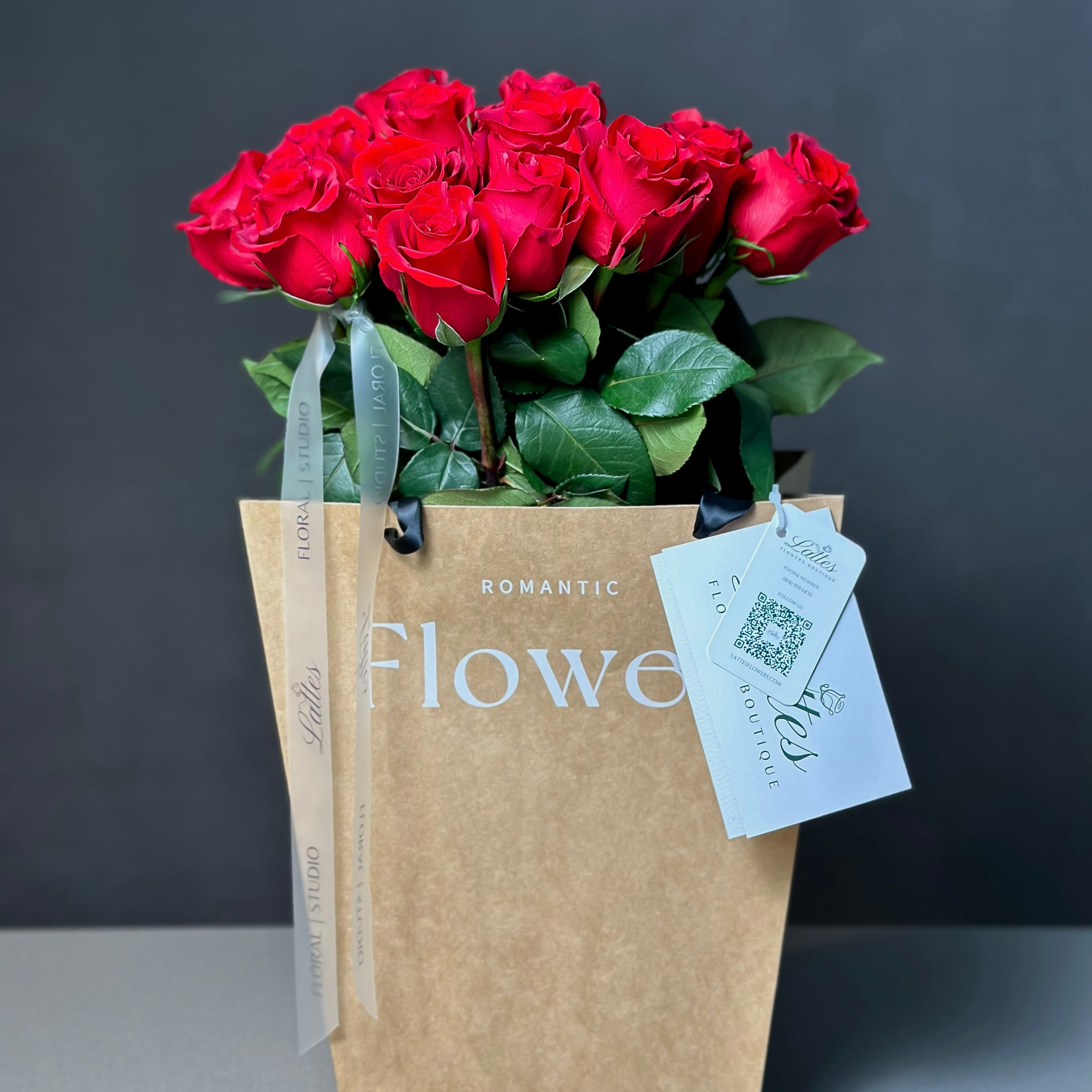 Red Roses in Aqua Vase