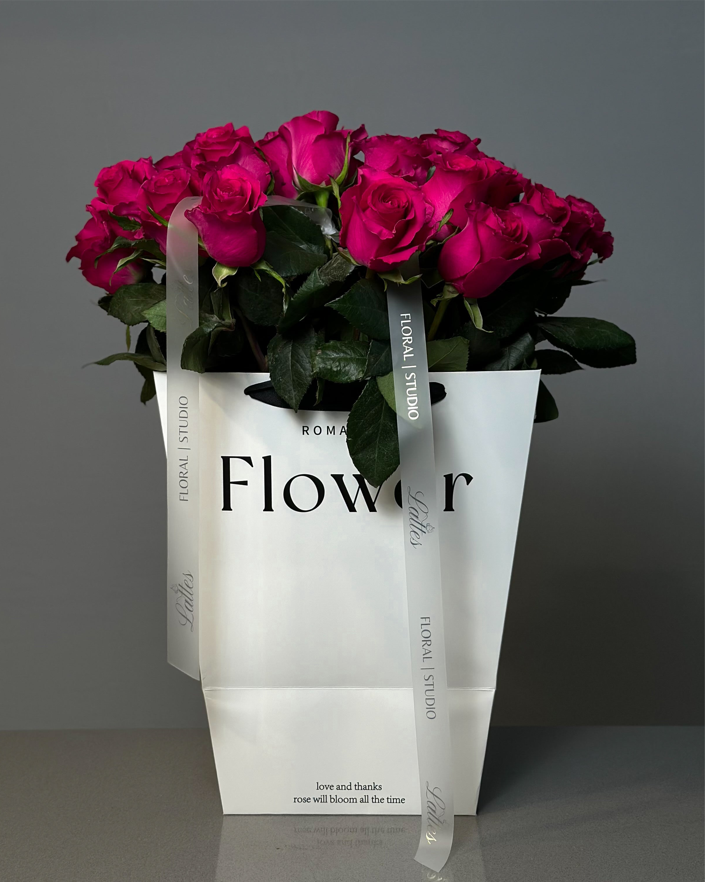 Dark Pink Roses in Aqua Vase