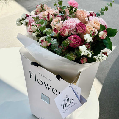 Terracotta Bouquet with roses and soft hues arranged elegantly in small to large sizes