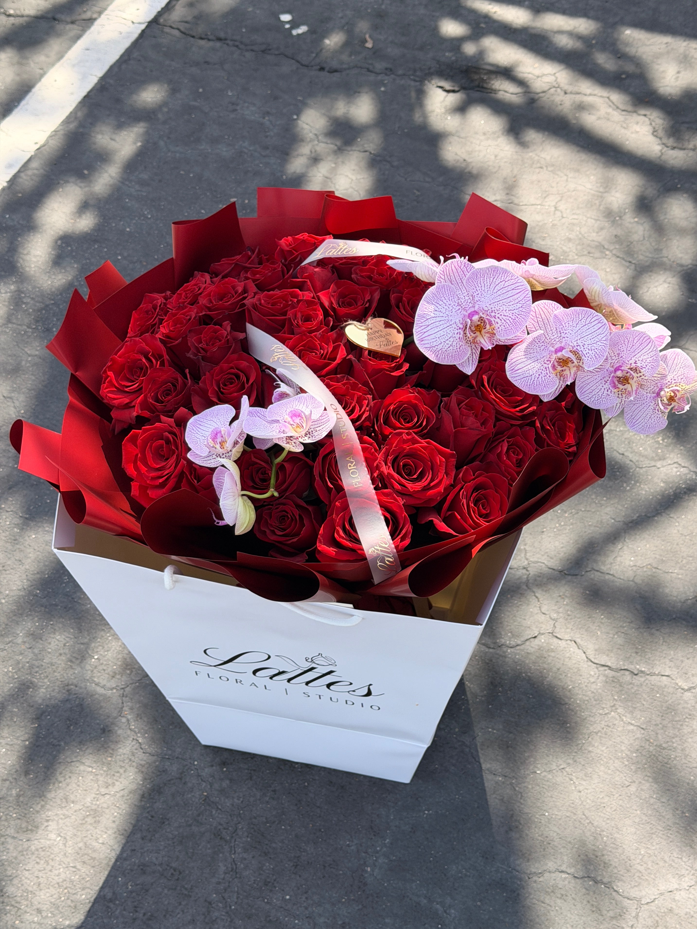 Scarlet Symphony – Red Roses with Orchids