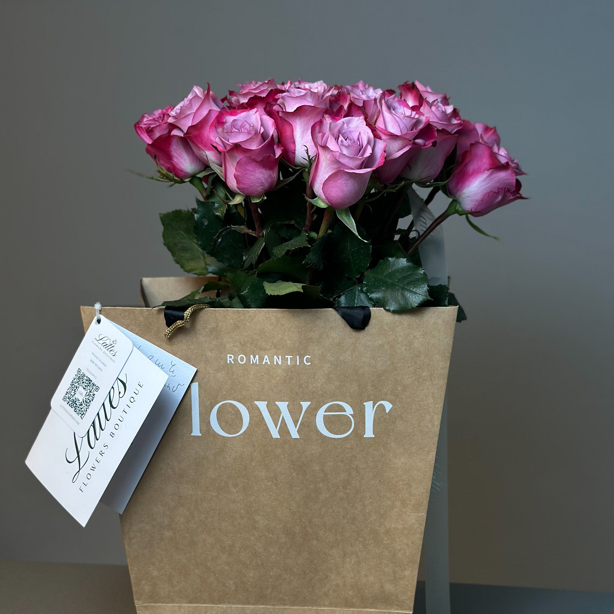 Purple Roses in Aqua Vase