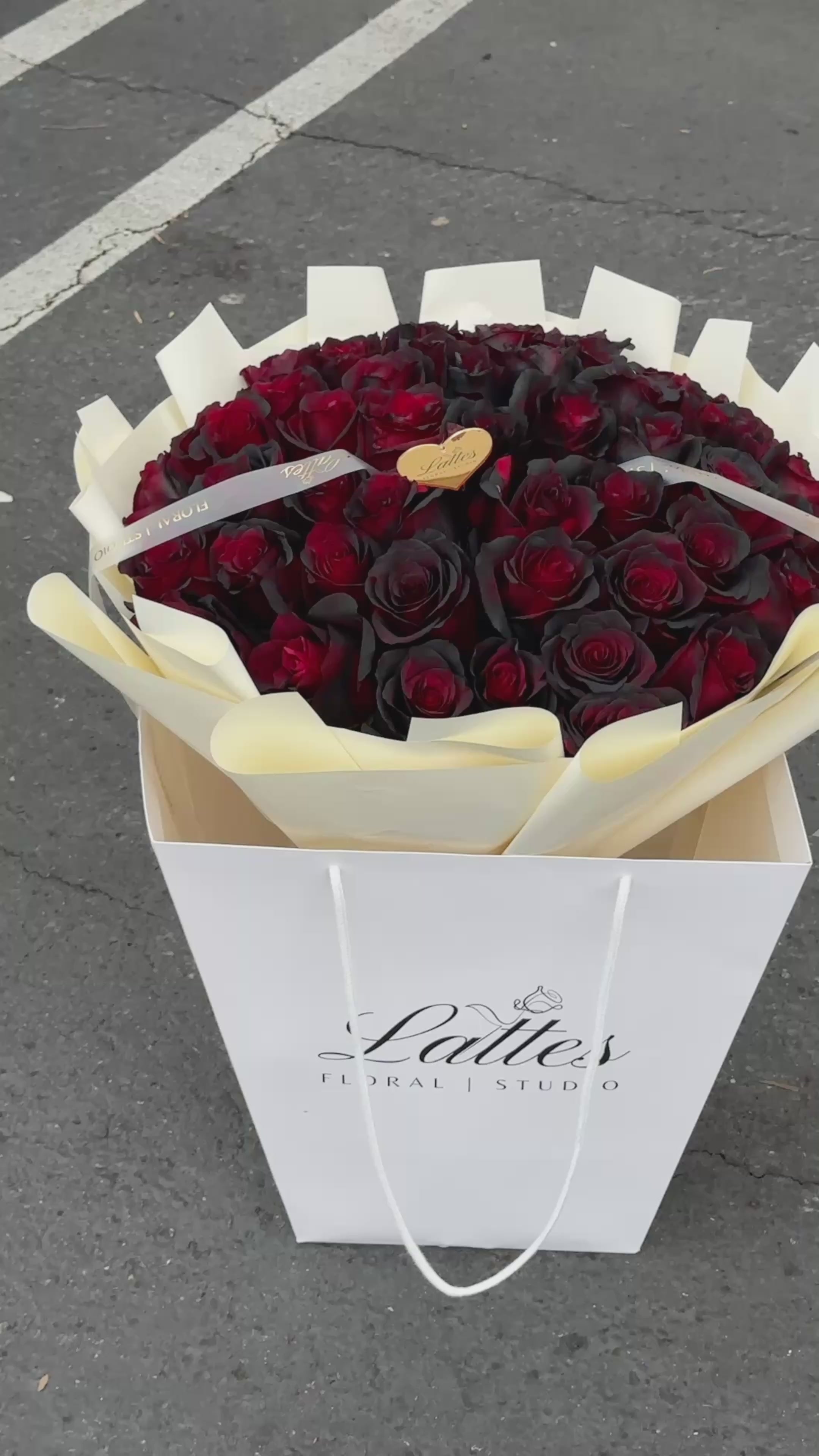 Load video: Midnight Passion Bouquet – Red &amp; Black Roses